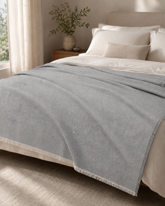 Colcha multiusos Otomán extendida sobre cama